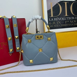 https://www.valentinooutletmall.com/valentino-garavani-small-sheepskin-roman-stud-handbag-blue.html