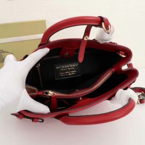 Burberry Medium Leather And Canvas Banner Bag In Red