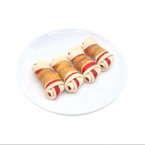Dog snack with a knotted bone structure wrapped in meat-based ingredients for pet chewing applic ...